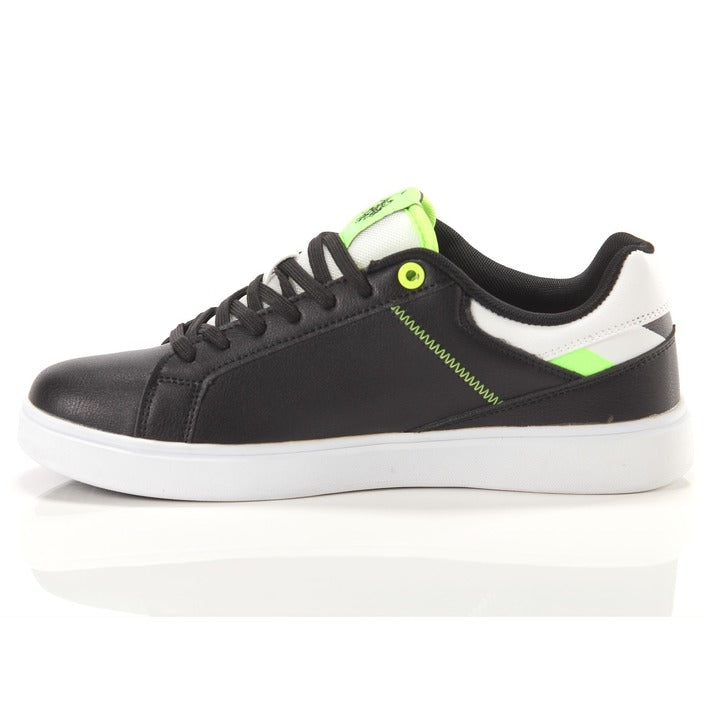una scarpa da ginnastica nera e bianca con dettagli verdi neon